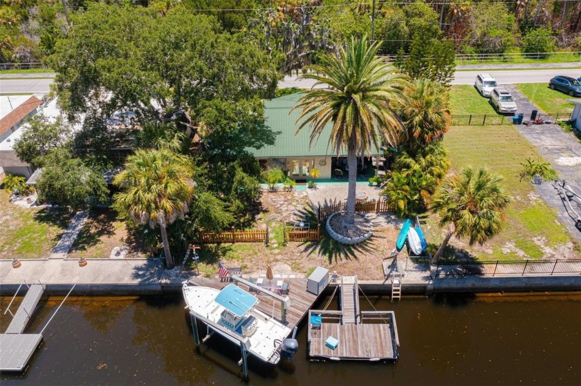 Waterfront home with Gulf access has a lift, davit, dock and - Beach Home for sale in Port Richey, Florida on Beachhouse.com