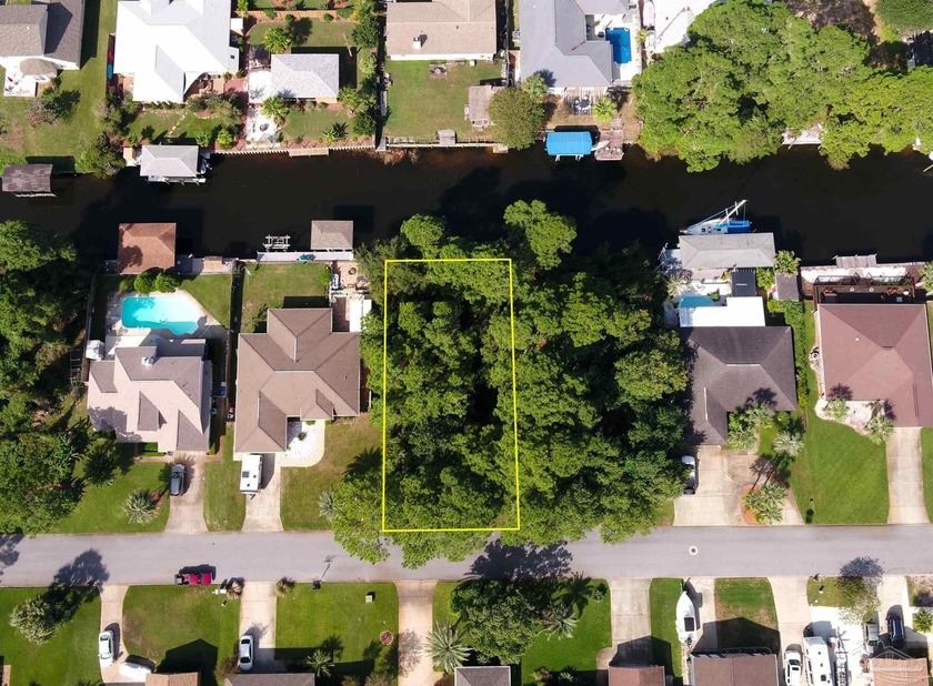 **Build Your Dream Waterfront Retreat!** Discover a rare - Beach Lot for sale in Gulf Breeze, Florida on Beachhouse.com