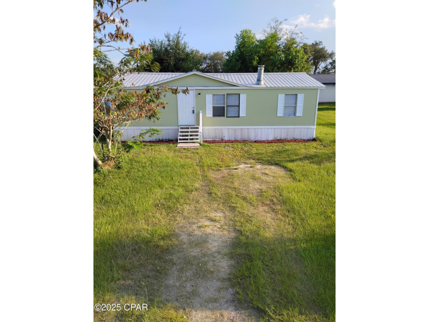 3 bedroom 2 bath single wide with 960 sq ft. Kitchen and - Beach Home for sale in Panama City, Florida on Beachhouse.com