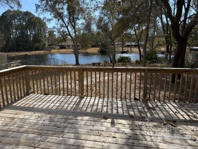 Welcome to 1031 Everglade Drive! This lake front, double-wide - Beach Home for sale in Niceville, Florida on Beachhouse.com