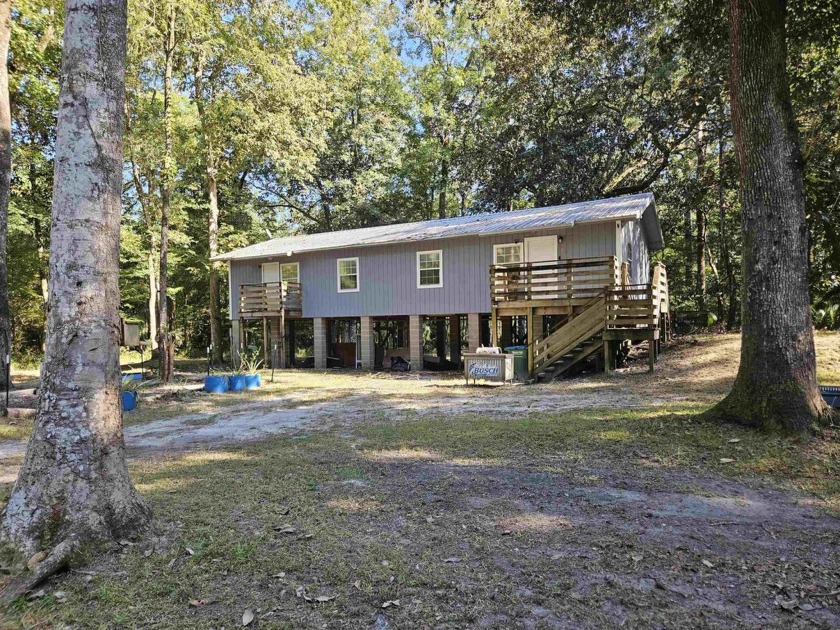 The interior of the home does need quite a bit of cosmetic - Beach Home for sale in Crawfordville, Florida on Beachhouse.com