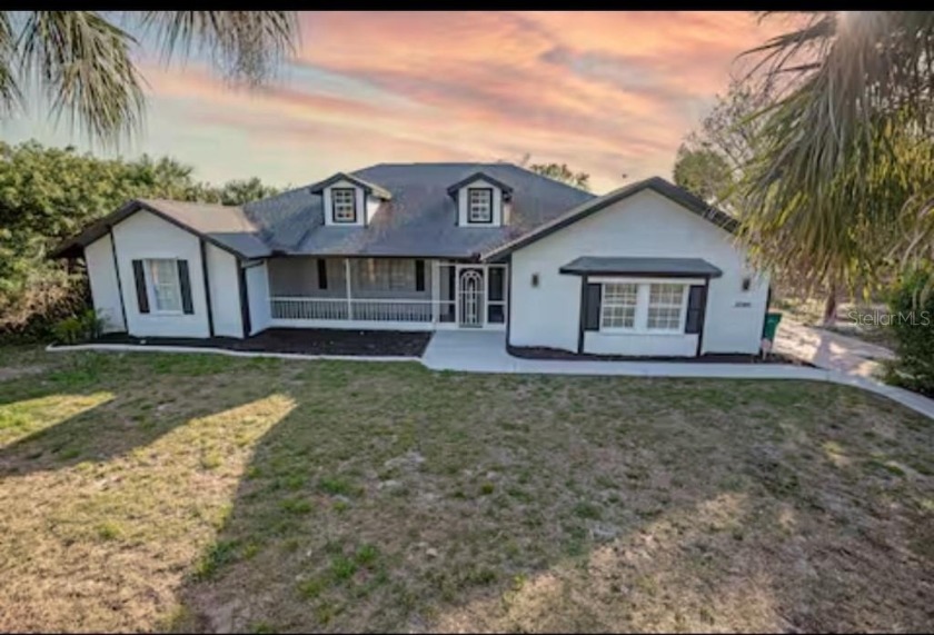 Perfect opportunity to own this traditional style water front - Beach Home for sale in Port Charlotte, Florida on Beachhouse.com