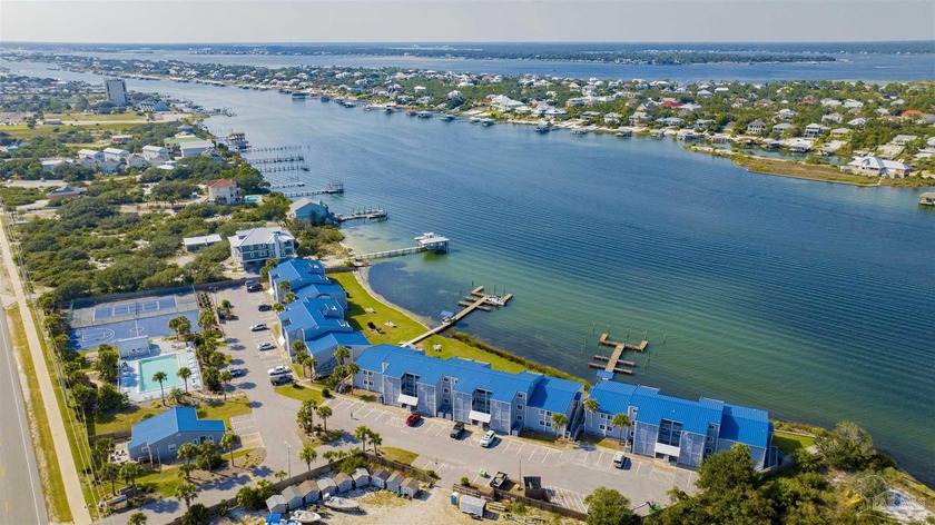 WELCOME TO LAID BACK ISLAND LIVING WITH THIS BEAUTIFULLY UPDATED - Beach Condo for sale in Perdido Key, Florida on Beachhouse.com