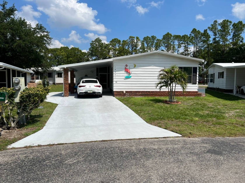 This TURNKEY manufactured home is on leased land. Lake Fairways - Beach Home for sale in North Fort Myers, Florida on Beachhouse.com