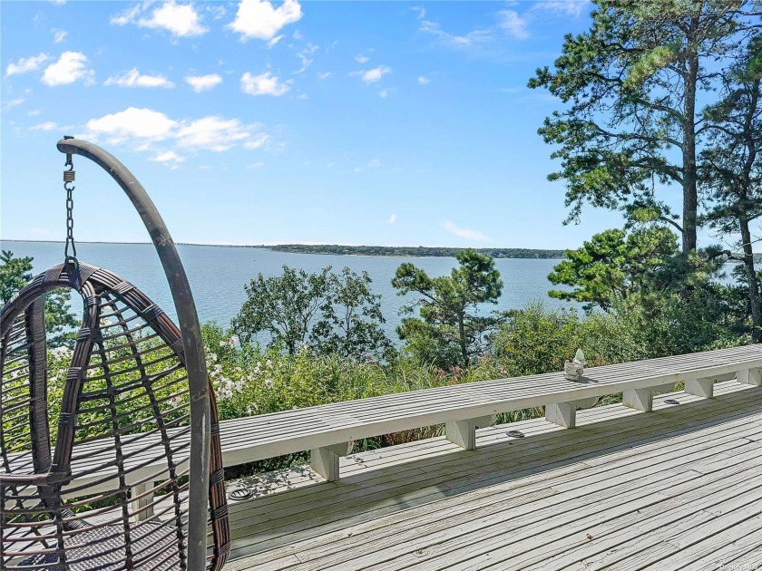 Nestled on a private road atop a bluff in Southampton, this - Beach Home for sale in Southampton, New York on Beachhouse.com