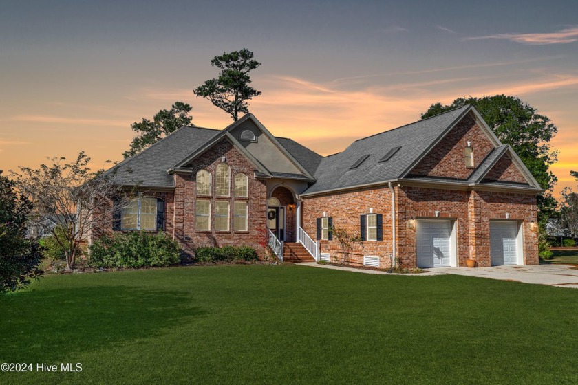 This exquisite custom home is situated on the Azalea 3 Fairway - Beach Home for sale in Calabash, North Carolina on Beachhouse.com