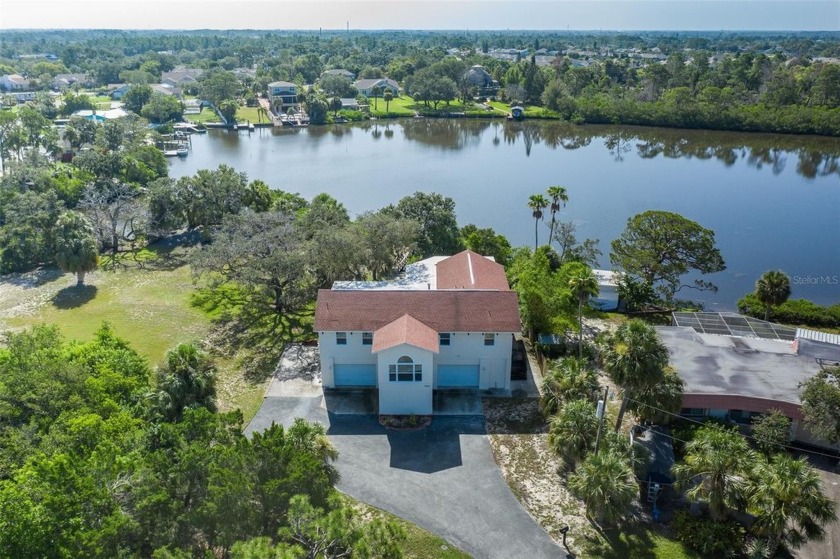 *PRIVATE FLORIDA PARADISE: WATERFRONT ESTATE WITH BONUS BUILDING - Beach Home for sale in Holiday, Florida on Beachhouse.com