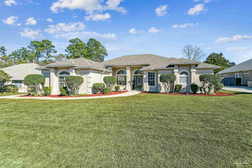 CUSTOM BUILT HOME with a beautiful, enclosed pool & large lanai - Beach Home for sale in Pensacola, Florida on Beachhouse.com