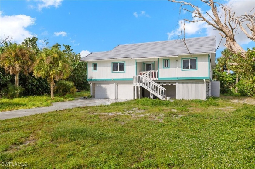 This spacious 4-bedroom, 3-bathroom home sits on an oversized - Beach Home for sale in Sanibel, Florida on Beachhouse.com