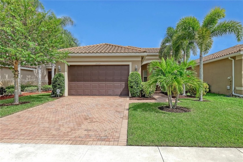 This beautifully maintained one-story home is located in a gated - Beach Home for sale in Boynton Beach, Florida on Beachhouse.com
