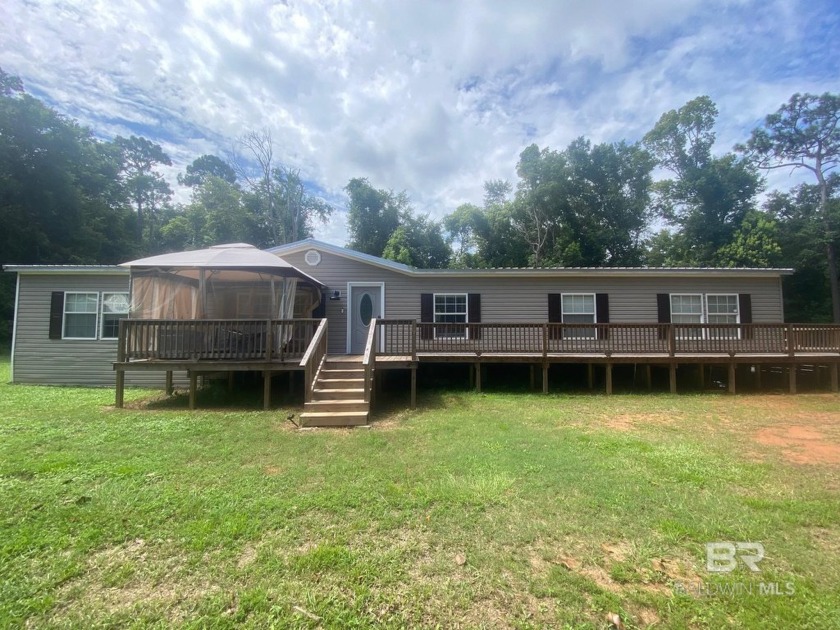 With a short drive to Pensacola, Foley, and numerous sugar sand - Beach Home for sale in Lillian, Alabama on Beachhouse.com
