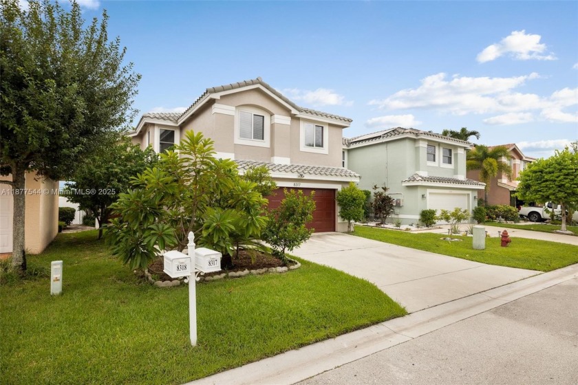 Spacious Mediterranean-style two-story home offering a refined - Beach Home for sale in Boynton Beach, Florida on Beachhouse.com