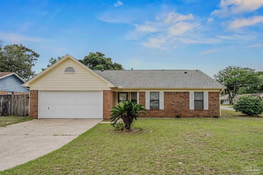 Move-in ready with the big-ticket updates already done. Nestled - Beach Home for sale in Pensacola, Florida on Beachhouse.com