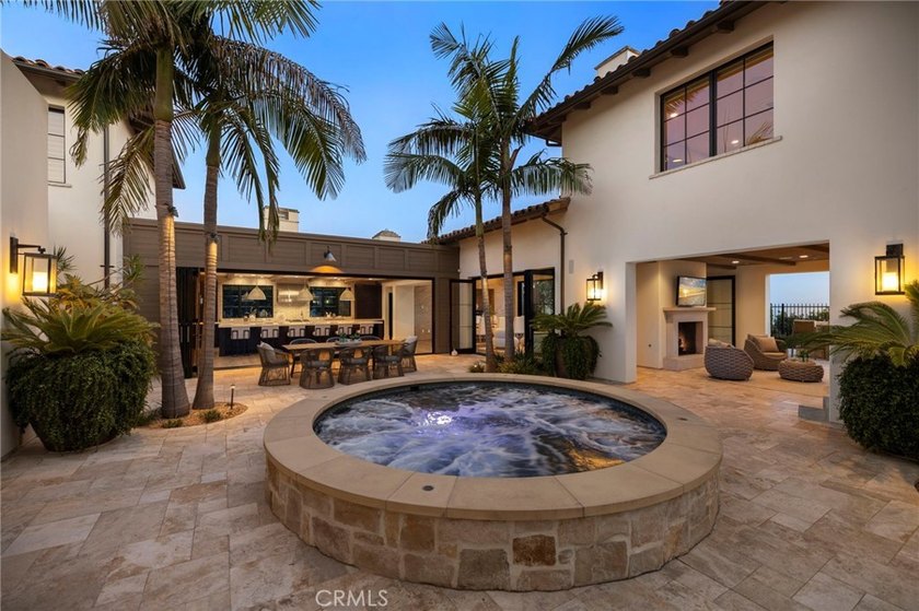Nestled within the prestigious guard-gated enclave of Crystal - Beach Home for sale in Newport Coast, California on Beachhouse.com