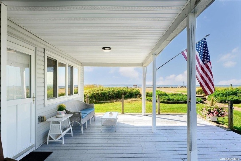 Enjoy the picturesque views of the Great South Bay and the Fire - Beach Home for sale in Sayville, New York on Beachhouse.com