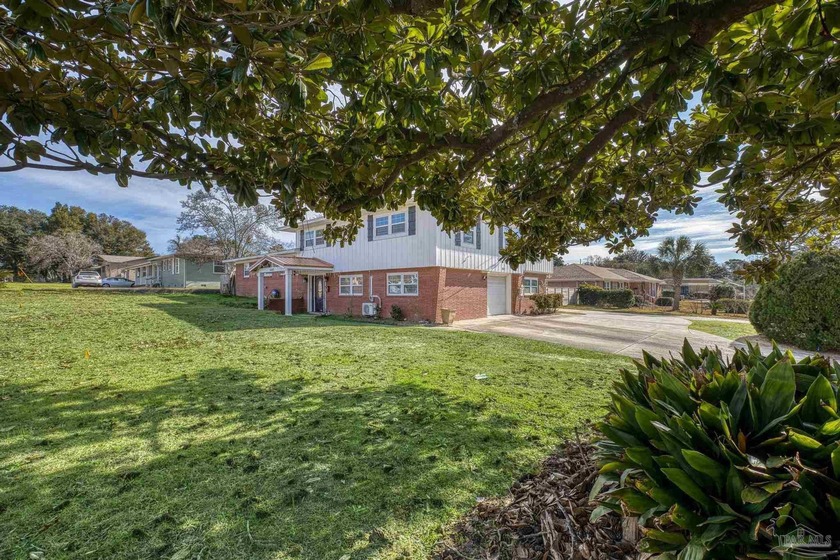 Spacious 5-6 Bedroom Pool Home with Office & Private Tropical - Beach Home for sale in Pensacola, Florida on Beachhouse.com