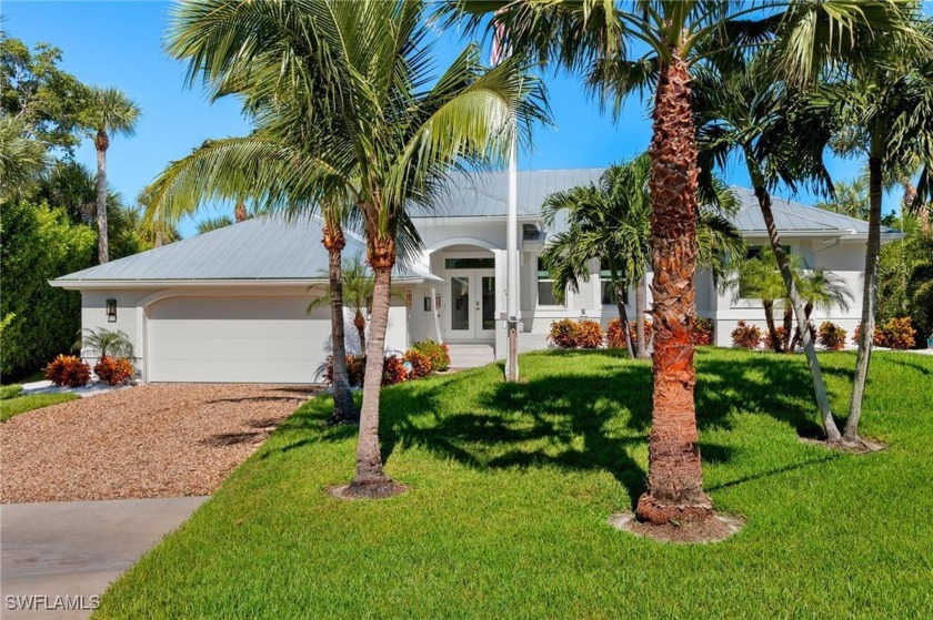 High and dry in recent storms, this beautifully renovated, like- - Beach Home for sale in Sanibel, Florida on Beachhouse.com