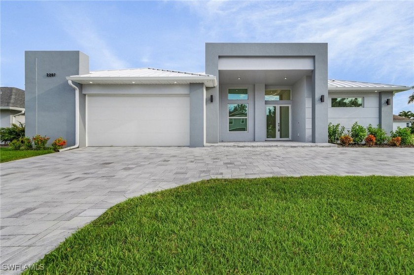 Welcome to this stunning, new construction waterfront home - Beach Home for sale in Cape Coral, Florida on Beachhouse.com