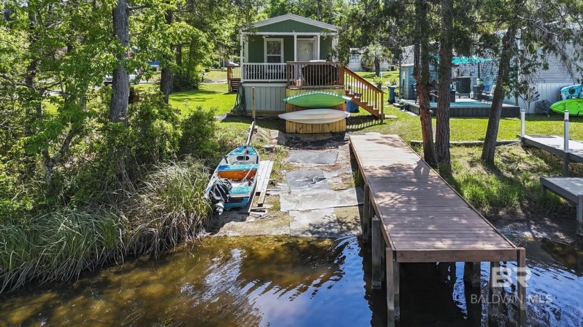 Experience the perfect blend of comfort and adventure at this - Beach Home for sale in Elberta, Alabama on Beachhouse.com