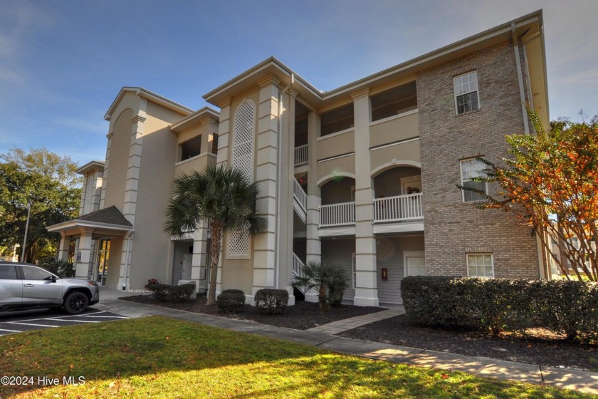 Welcome to this spectacular furnished 3 bedroom, 2 bath first - Beach Condo for sale in Sunset Beach, North Carolina on Beachhouse.com