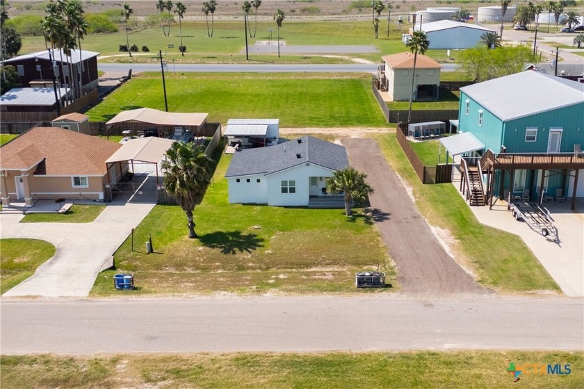 This completely remodeled home is sure to take care of you and - Beach Home for sale in Port Mansfield, Texas on Beachhouse.com