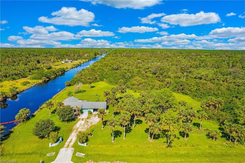 Incredible opportunity to make this canal front home on 5.54 - Beach Home for sale in Naples, Florida on Beachhouse.com