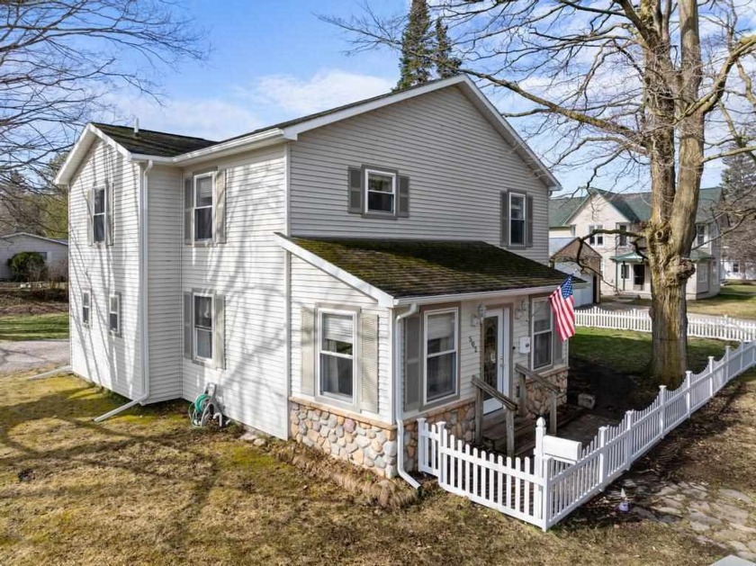 This 4 bedroom, 3 bath home in downtown Charlevoix offers a - Beach Home for sale in Charlevoix, Michigan on Beachhouse.com
