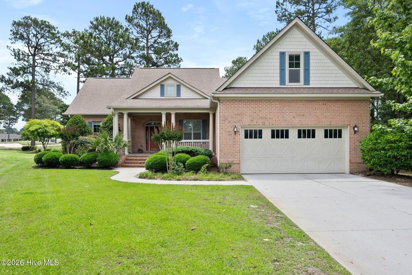 Positioned on a quiet cul-de-sac in Magnolia Greens, this - Beach Home for sale in Leland, North Carolina on Beachhouse.com