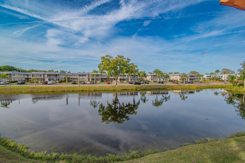 LAKE VIEWS!! Beautiful Private Corner Unit Light and Bright 2 - Beach Condo for sale in Delray Beach, Florida on Beachhouse.com