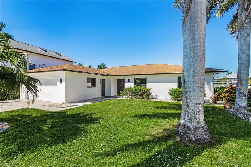 Location! Location! Location! This bayfront house has over 100' - Beach Home for sale in Naples, Florida on Beachhouse.com