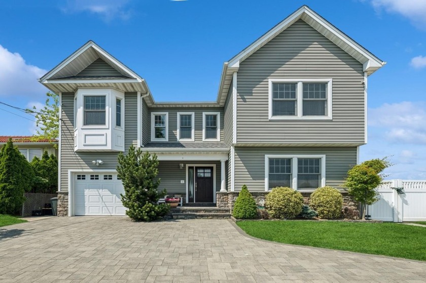Welcome To This Harbor Isle Bayfront Beauty!! Experience the - Beach Home for sale in Island Park, New York on Beachhouse.com