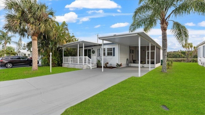 Bright open floor plan home w/ updated kitchen & baths. Large - Beach Home for sale in Barefoot Bay, Florida on Beachhouse.com