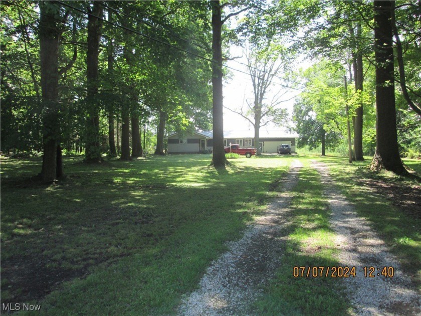 Very secluded 3 Bedroom Ranch on scenic 2.93 acres in highly - Beach Home for sale in Ashtabula, Ohio on Beachhouse.com