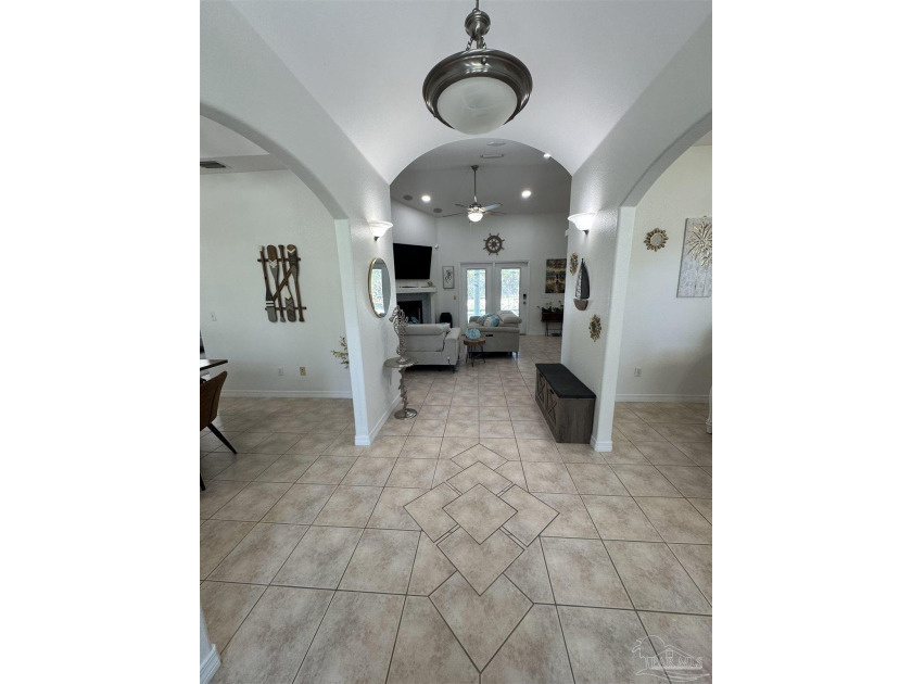 Located about 12 minutes from Navarre Beach and 26 minutes from - Beach Home for sale in Navarre, Florida on Beachhouse.com