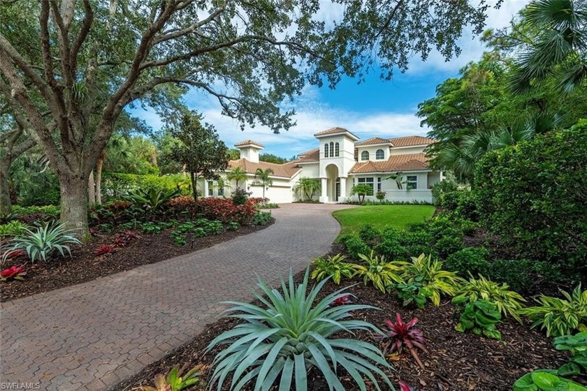 Tucked away on a quiet, tree-lined street in the exclusive - Beach Home for sale in Naples, Florida on Beachhouse.com