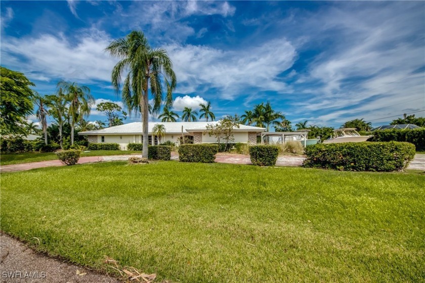 Diamond in the rough Estate home overlooking the #5 hole of - Beach Home for sale in Fort Myers, Florida on Beachhouse.com