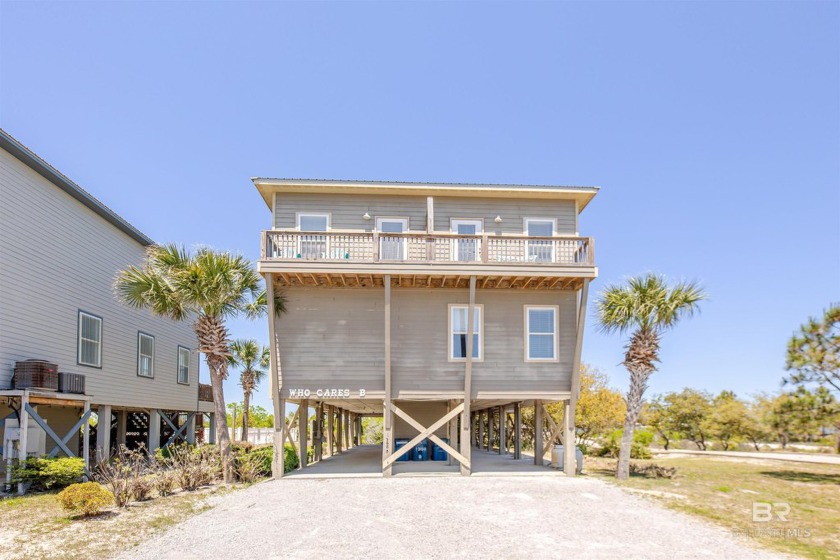 The perfect setting with remarkable sunsets on Little Lagoon - Beach Home for sale in Gulf Shores, Alabama on Beachhouse.com