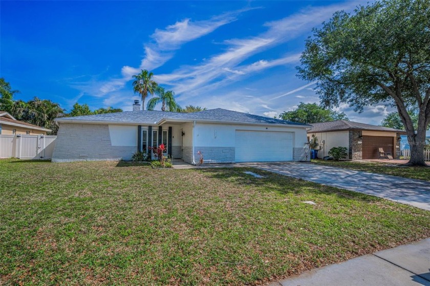 Welcome Home to Your Florida Oasis! Step into this stunning - Beach Home for sale in Oldsmar, Florida on Beachhouse.com