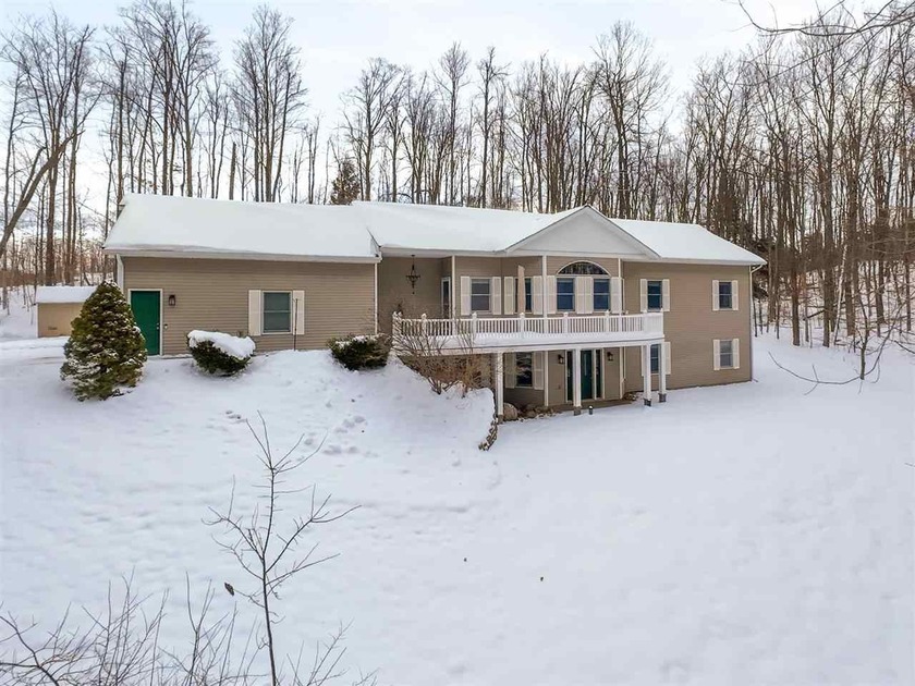 Nestled in a very private setting close to Petoskey, this - Beach Home for sale in Petoskey, Michigan on Beachhouse.com