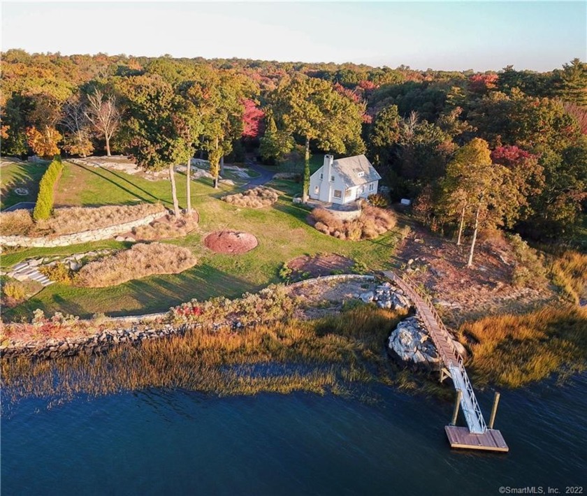 A magnificent property with a dock sits high above Scotts Cove - Beach Home for sale in Darien, Connecticut on Beachhouse.com