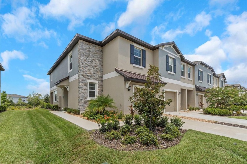 GORGEOUS...Better than new! Step into modern living with this - Beach Townhome/Townhouse for sale in Land O Lakes, Florida on Beachhouse.com