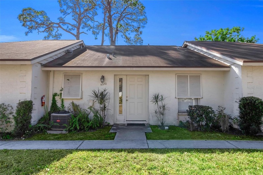 WELCOME to this beautifully maintained 2 bedroom, 2 bath villa - Beach Home for sale in Sarasota, Florida on Beachhouse.com