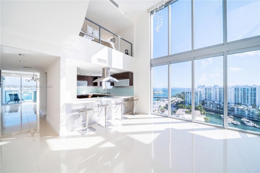 Step into luxury living in this remarkable two-story penthouse - Beach Condo for sale in North Bay Village, Florida on Beachhouse.com