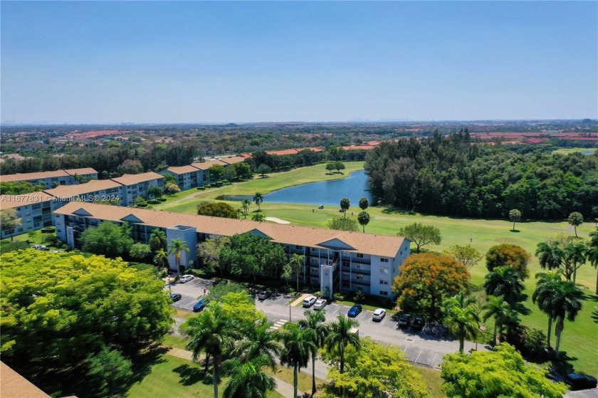 Enjoy beautiful golf course views from the large screened porch - Beach Condo for sale in Pembroke Pines, Florida on Beachhouse.com