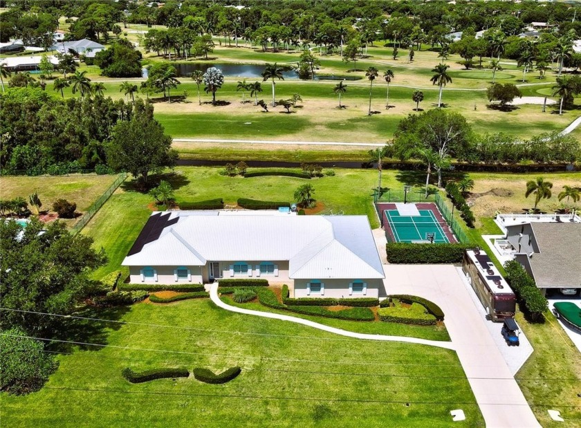 One-of-a-Kind TROPICAL Oasis! Hurricane-Safe Estate on 1+AC w/ - Beach Home for sale in Fort Pierce, Florida on Beachhouse.com