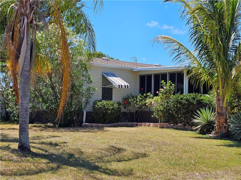 Relax, enjoy a good book or your morning coffee in the beautiful - Beach Home for sale in Barefoot Bay, Florida on Beachhouse.com
