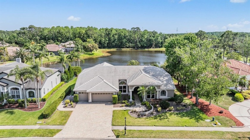 Welcome to this exquisite executive estate nestled in the - Beach Home for sale in Oldsmar, Florida on Beachhouse.com