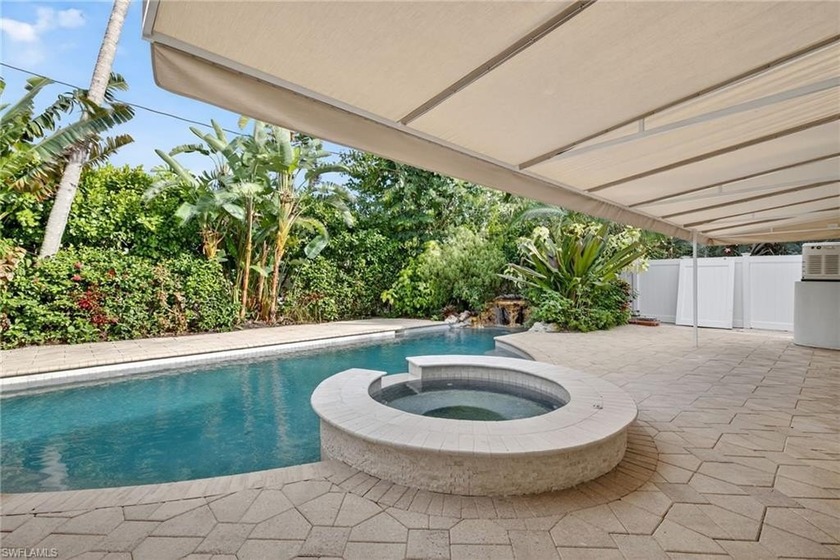 Welcome home! This FULLY RENOVATED 3-bedroom, 3-bath WATERFALL - Beach Home for sale in Naples, Florida on Beachhouse.com