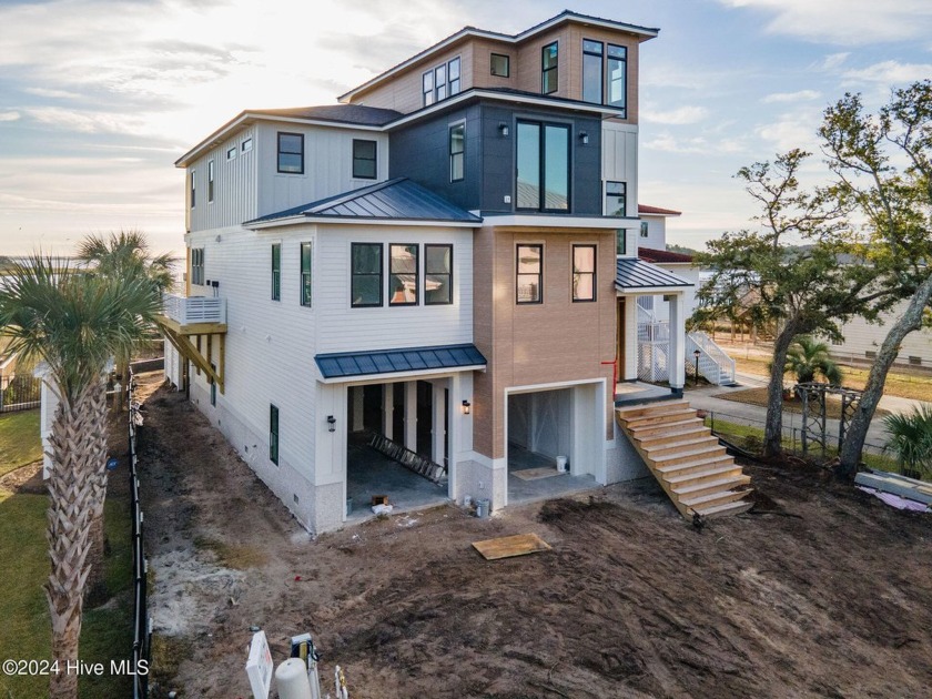 Discover coastal contemporary living in this brand-new - Beach Home for sale in Wilmington, North Carolina on Beachhouse.com