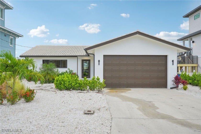 Stunning 3 bedroom 2 bath waterfront pool home ready for - Beach Home for sale in Fort Myers Beach, Florida on Beachhouse.com